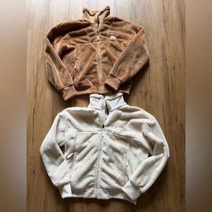 The North Face Brown and White Fleece Jackets